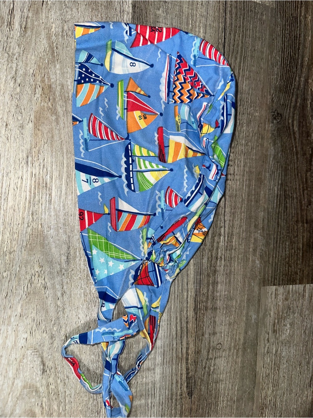Sailboat tie-back surgical cap